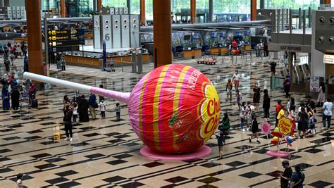 Changi Airport eases safety measures as borders reopen.